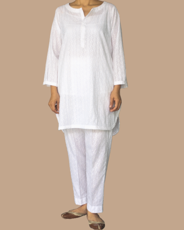 white chikankari kurta with matching trouser