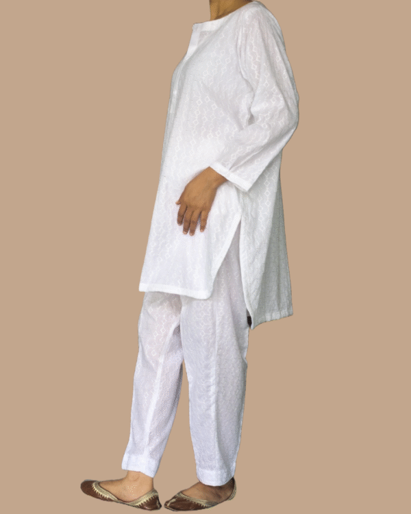 white chikankari kurta with matching trouser