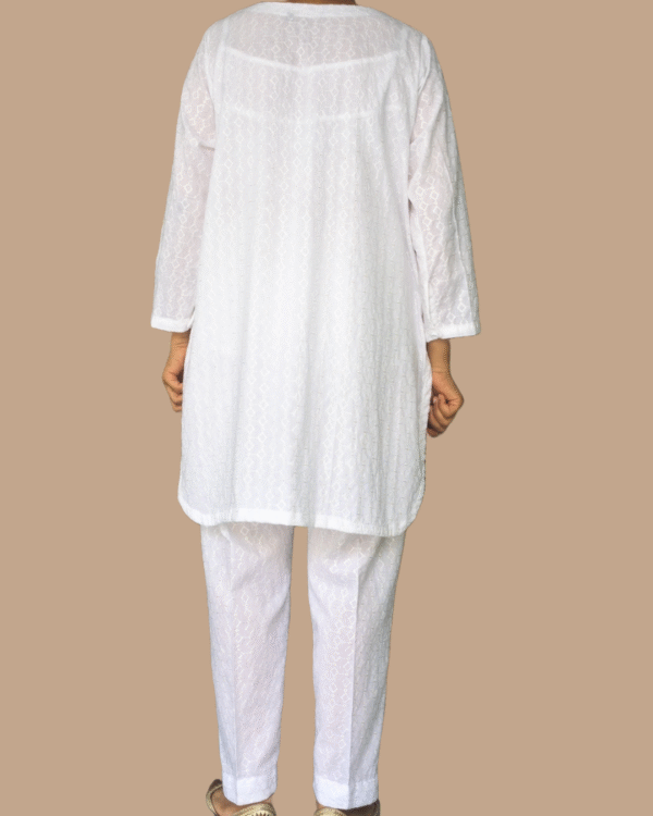 white chikankari kurta with matching trouser