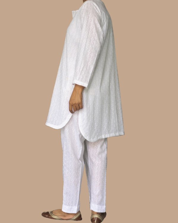 white chikankari kurta with matching trouser